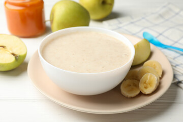 Wall Mural - Composition with baby food on white wooden background