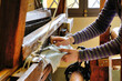hand weaving with ancient loom