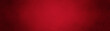 © Attitude1 - Red Christmas background texture design in panoramic banner or old vintage background template with shiny center and black vignette