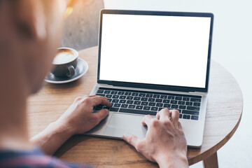 computer mockup image blank screen.hand man work using laptop with white background for advertising,contact business search information on desk at coffee shop.marketing and creative design