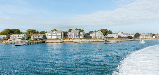 Sticker - Charactistic style Cape Cod architecture along waters edge.