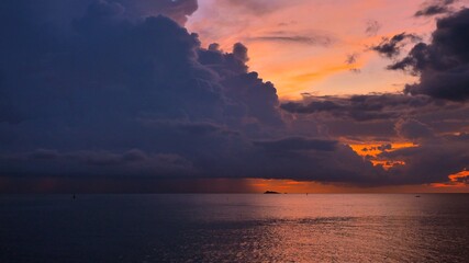 Wall Mural - Sunset time above the ocean, water surface at sunset time, nature background static shot