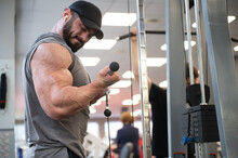 Mighty Strong Male With Beard Lifting Heavy Weight In Sport Gym During Training Workout
