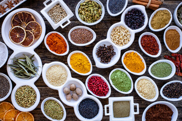  Many multi colored spices and dried fruits on the table