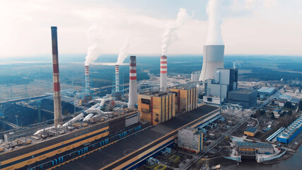 air pollution concept. power plant with smoke from chimneys. drone aerial kozienice power plant - sw