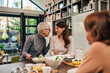 © bnenin - Happy family having lunch at home.