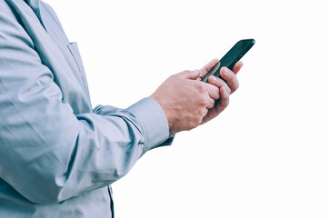 Businessman in shirt holding smartphone in hands isolated on white background.