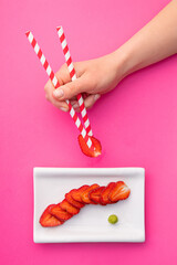 Wall Mural - Creative image of fresh strawberries in the form of sushi rolls