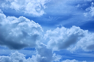 Wall Mural - Fluffy white clouds in the blue sky