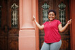 © AS Photo Family - African woman wear red t-shirt posing outdoor.