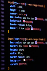 Wall Mural - close-up of modern css3 cascade style sheet programming code for html coding. vertical photo.