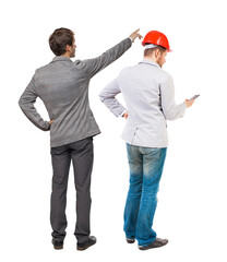 Wall Mural - Back view of two business man in suit with mobile phone.