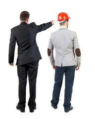 Poster - Back view of business man and business woman in suit pointing.