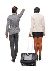 Wall Mural - Back view of two business people in suit pointing.