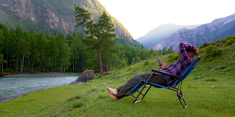 Wall Mural - Men with smart phone outdoors