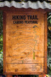Hiking trail wooden information board at Machu Picchu, Peru