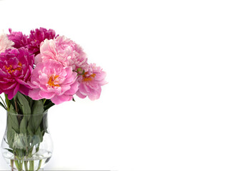 Wall Mural - Bouquet of white and pink peonies in the vase isolated on white.