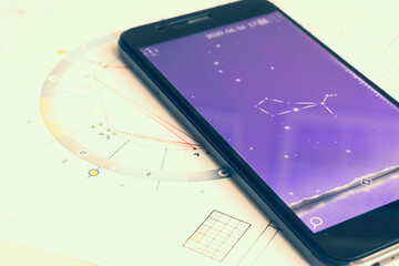 the desktop of an astrologer. gadgets help the modern oracle to make calculations. the magical myste