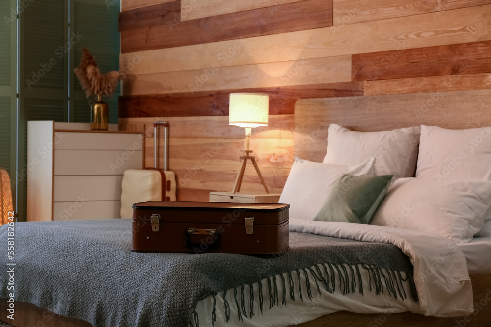 Interior of modern hotel room in evening