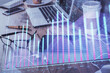 © peshkova - Double exposure of forex chart drawing and cell phone background. Concept of financial trading