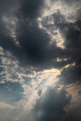 Wall Mural - picturesque clouds in the sky. window view of an airplane on a sunny gloomy day. stock photo backgro