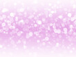 © PurMoon - Bokeh colorful glows sparkle beautiful Valentines Day concept. Abstract violet Bokeh circles for Christmas background. Purple blur abstract background.
