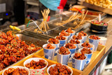 Fototapeta Paryż - Chicken fried in Myeong-dong street food, Seoul, South Korea