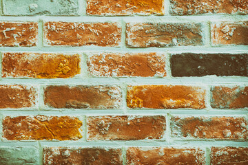 Orange burnt brick wall background, Vintage color tone.