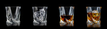 Set Of Four Glasses For Alcoholic Drinks On Black Background