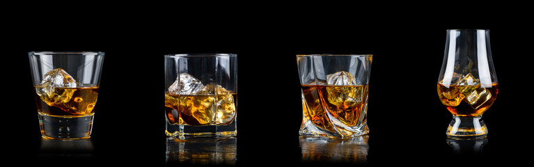 Sticker - Set of four glass of whiskey with cube ice on black background