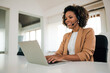 © bnenin - Portrait of a beautiful customer support operator with headset working on laptop.