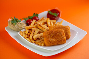 Roasted breaded  cheese with tomato sauce  french fries.