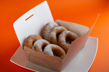 Wall Mural - Yummy yellow dougnuts with granulated sugar.