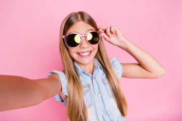 Poster - Close up photo of candid cute child girl cool instagram blogger make selfie enjoy weekend holiday wear trendy style outfit isolated over pastel color background