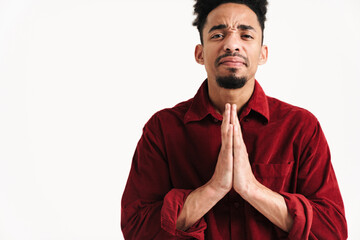 Poster - African young man showing pray please gesture