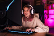 © Drobot Dean - Image of excited girl smiling and playing video game on computer