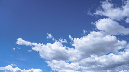 Wall Mural - picturesque clouds in the sky. window view of an airplane on a sunny gloomy day. stock photo backgro