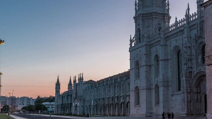 Wall Mural - Mosteiro dos Jeronimos day to night transition timelapse (Hieronymites Monastery), located in the Belem district of Lisbon, Portugal. Typical example of the Manueline style. UNESCO World Heritage Site