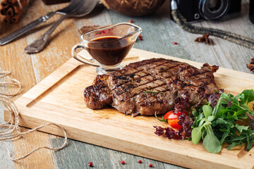 Wall Mural - Appetizing beef steak with grilled vegetables