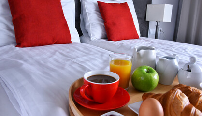 Wall Mural - Breakfast on tray in bed in hotel room