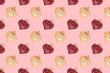 © rorygezfresh - Pattern made of New Year decorations in heart shape on a pink pastel background. Creative festive concept.