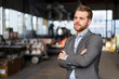 © Westend61 - Portrait of a confident young businessman in a factory