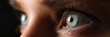 Leinwandbild Motiv Amazing female green colored eyes in low light technique