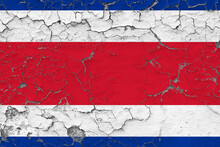 Costa Rica Flag Close Up Grungy, Damaged And Weathered On Wall Peeling Off Paint To See Inside Surface. Vintage Concept.
