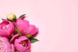 Fototapeta Tulipany - Beautiful fresh peonies on pink background, flat lay. Space for text