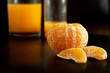 The oranges look delicious Placed on a black background Is a fruit that can be squeezed into water Health benefits