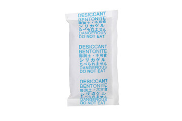 A packet of desiccant bentonite with English, Chinese and Japanese text warning label - 'dangerous, do not eat'. Object isolated on white background.