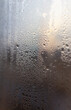 © schankz - Drops of water on a glass window at dawn as an abstract background.