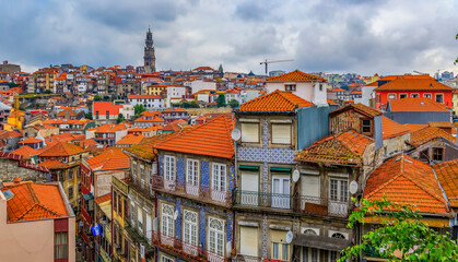 Wall Mural - Facades of traditional houses decorated with ornate Portuguese azulejo tiles in Porto, Portugal