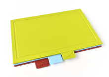 Colored Plastic Cutting Boards On A Light Background